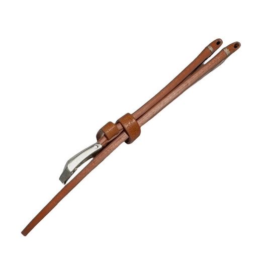 Side view of a tan brown leather strap