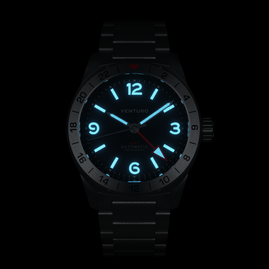 Black wristwatch with glowing blue numbers on a white background