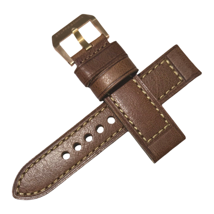 Brown leather watch strap with gold buckle on a white background