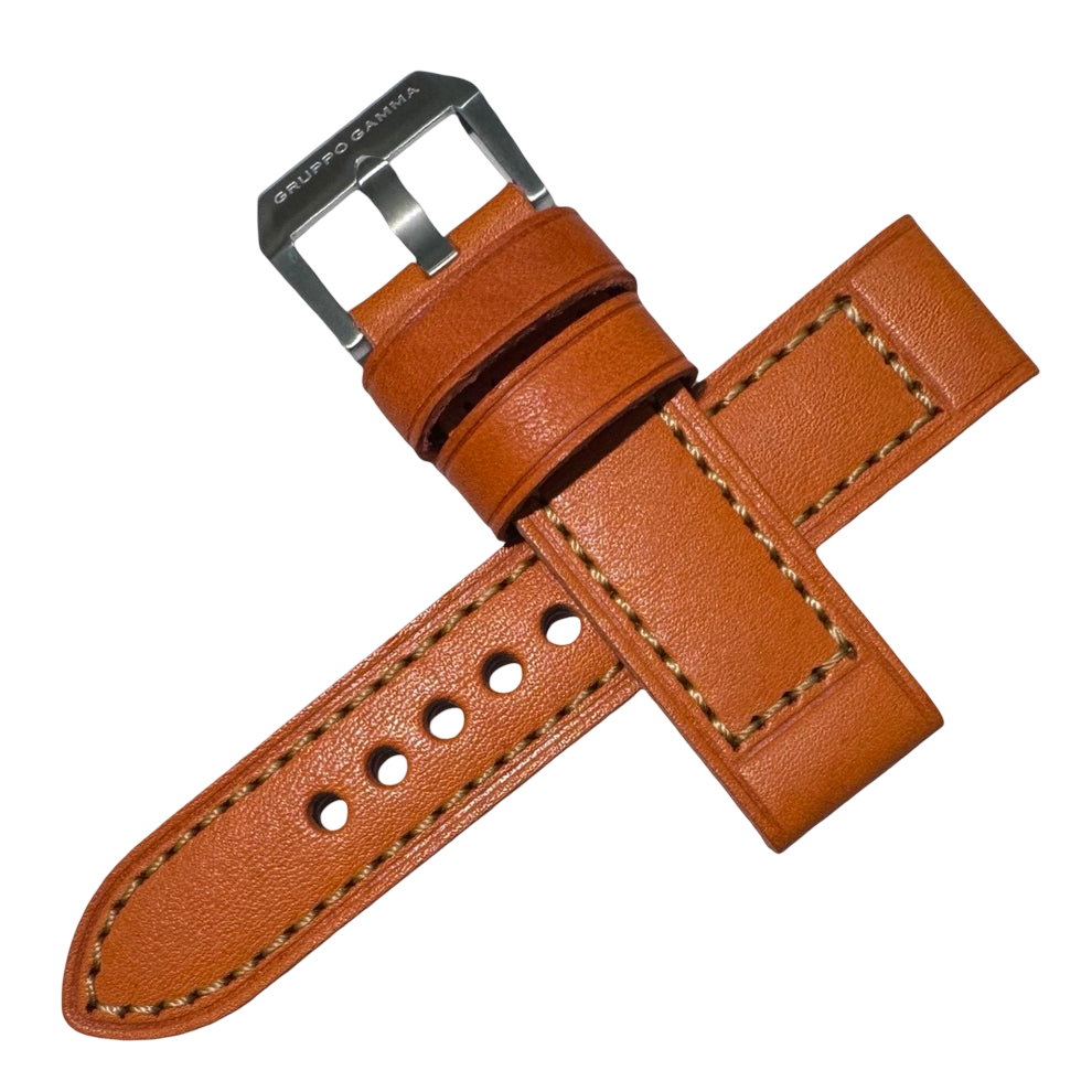 Brown leather watch strap with silver buckle on a white background
