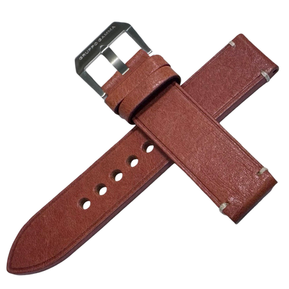 Brown leather watch strap with silver buckle on a white background