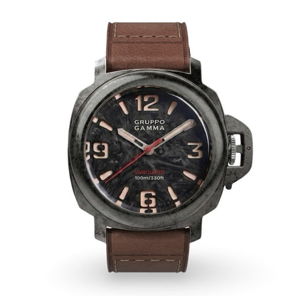 A Gruppo Gamma wristwatch with a dark textured dial, gold-tone numerals and hands, and a brown leather strap, shown against a plain white background.