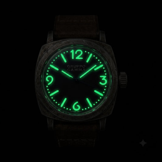 A Gruppo Gamma wristwatch with an aged steel case and a glowing green luminescent dial and numerals, shown against a solid black background.