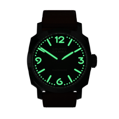 Black watch with green glowing face on a white background