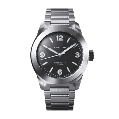 Silver watch with black dial on a white background