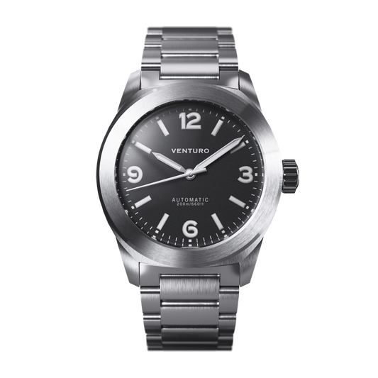 Silver watch with black dial on a white background