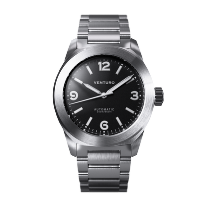 Silver watch with black dial on a white background