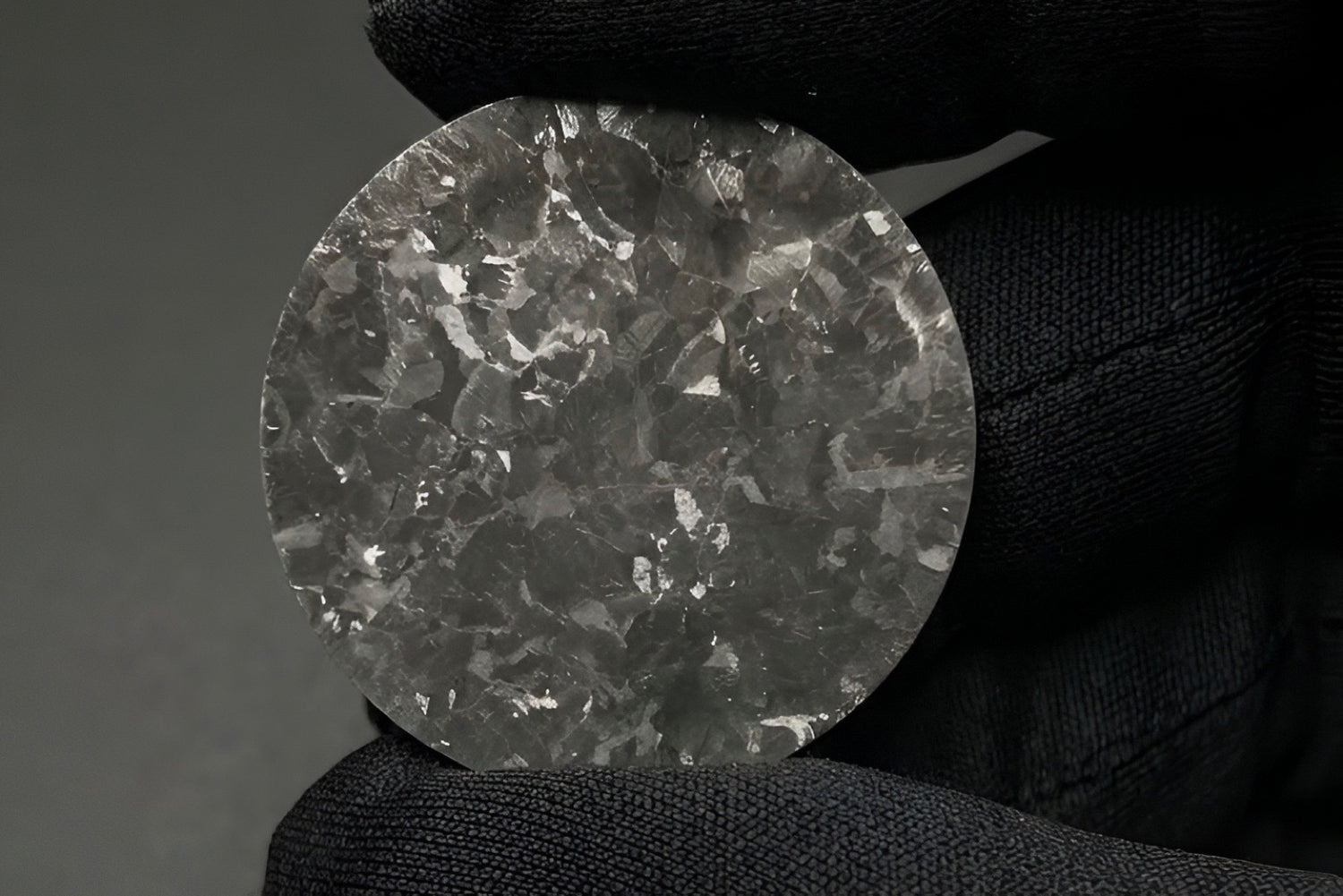 Close-up of a Gruppo Gamma watch dial made of crystallised titanium.